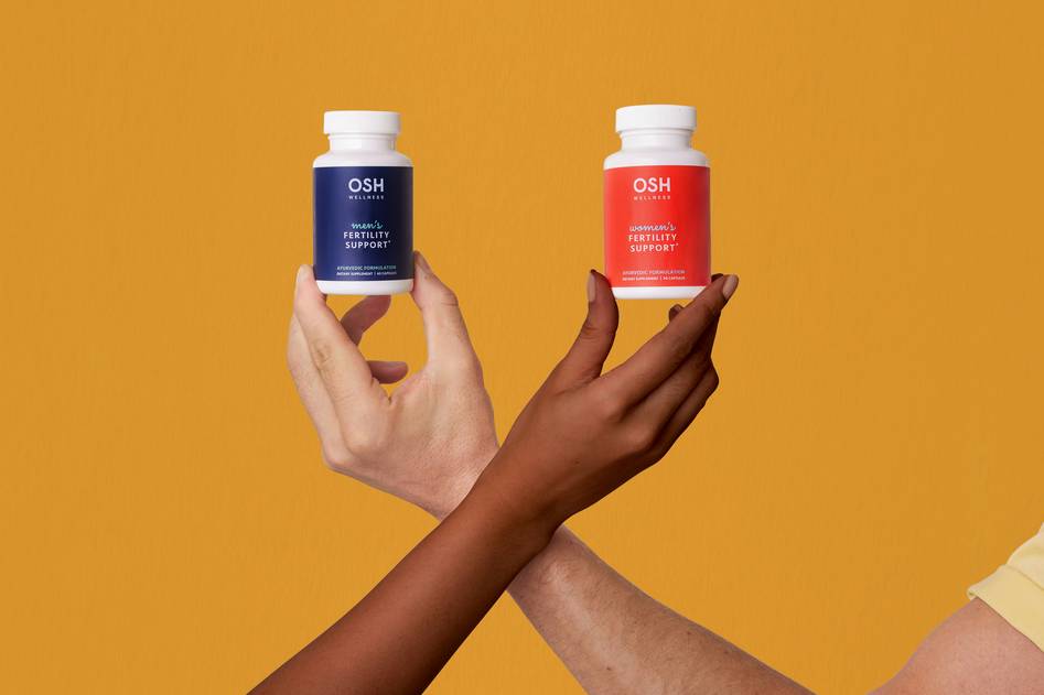 Natural botanicals and supplement capsules on soft linen